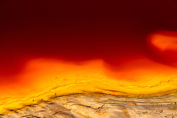 Abstract background of river with red and orange water