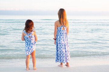 Sisters in Matching Dresses on Beach