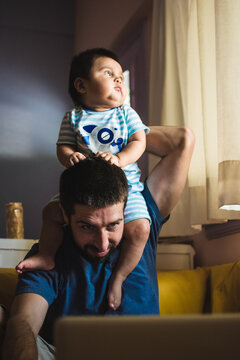 Dad trying to work and babysit 