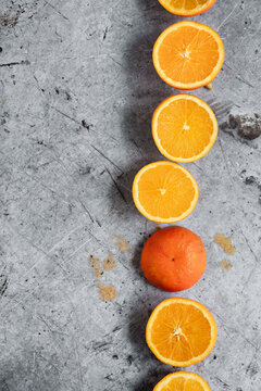 Cut tangerines in a line