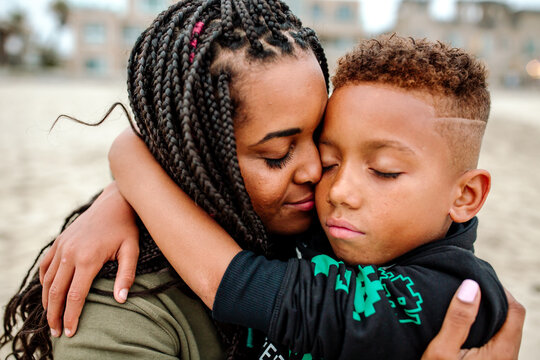 Tender embrace between mother and son