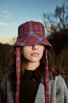 Woman With A Hat Over Her Eyes