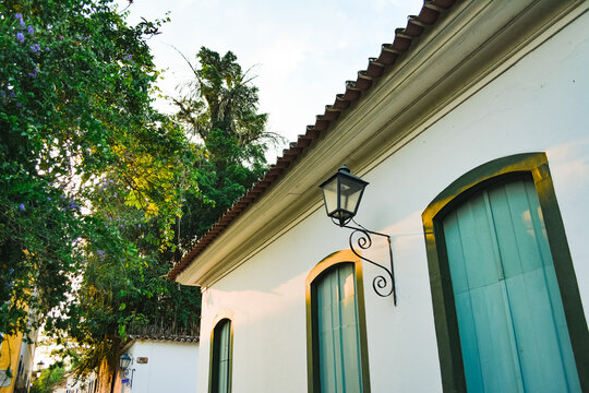 Windows and lamp detail in colonial house