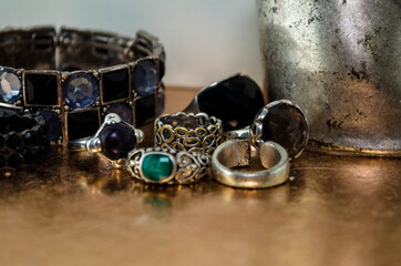 
Old metal rings with precious and mineral stones, old bracelets and necklaces