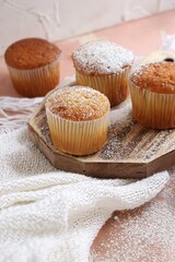 muffins compositions over a wood table with sugar glass 