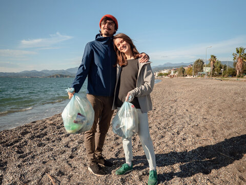 Collecting garbage on the beach