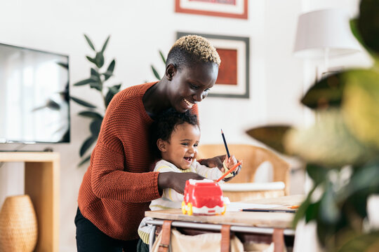 Black Afro Mother And Daughter Having Fun
