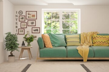 White living room with sofa and summer landscape in window. Scandinavian interior design. 3D illustration
