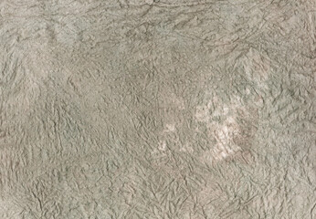 Weathered grungy watercolor background. Aged paper crumpled messy texture.