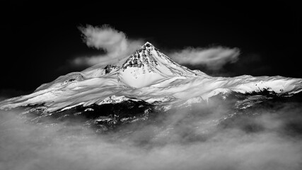 Black and white image of a snow covered mountain in Patagonia