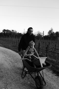 a father and son having fun in a garden
