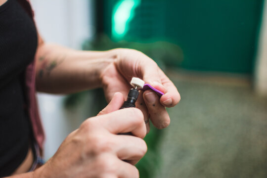 Working on a jewelry piece with a tool