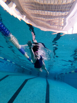 young woman training in the pool