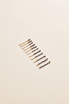 Row of differently burnt matches