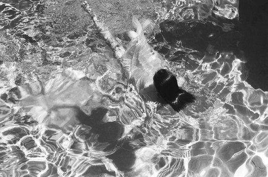 A woman swimming in a pool