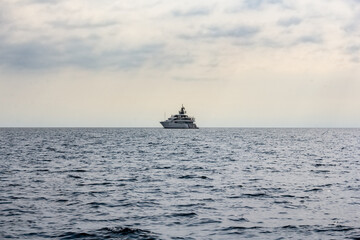 Private yacht at sea at anchor.