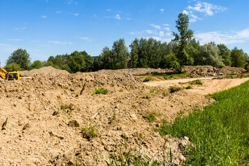 Heaps of soil on the site.