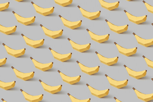 Pattern of yellow bananas on gray background
