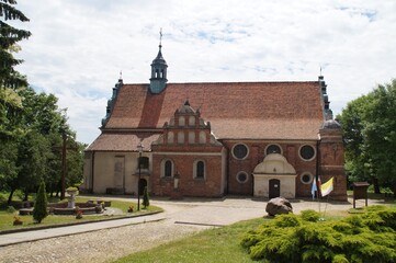 Fototapeta na wymiar gothic-renaissance church of the Exaltation of the Holy Cross From the mid-16th century in Zakroczym, Poland