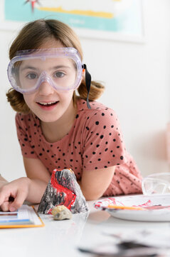 Portrait of a Student with Volcano Science Project