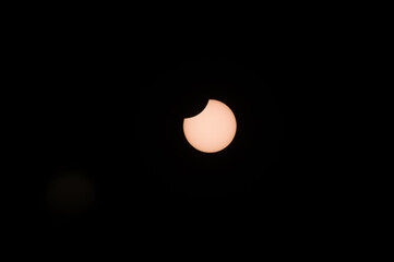 Partial solar eclipse the sun with a bite from the solar disk from the Netherlands