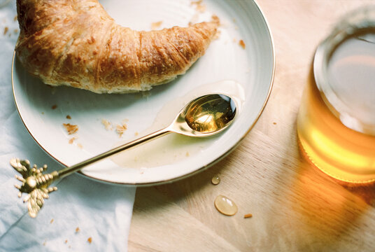 croissant and honey