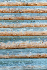 texture of old wooden logs with picturesque knots as a natural background