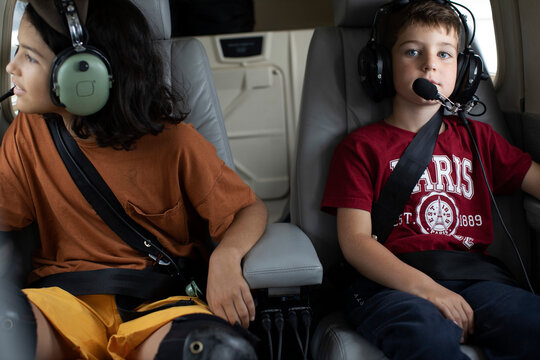 Diverse children in light aircraft