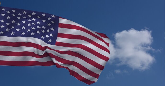 Composition of billowing american flag over cloudy blue sky