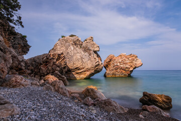 Fototapeta na wymiar Sea beach in Beldibi and the rocks. Turkey, Kemer region, may 2021