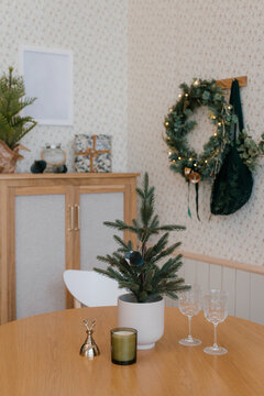 Table with wineglasses and Christmas decorations