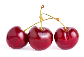 Ripe fresh red cherry isolated on white background. With clipping path.