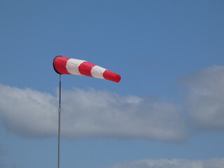 Windsock flag to tell wind direction and speed, Brzezno beach, Gdansk, Poland