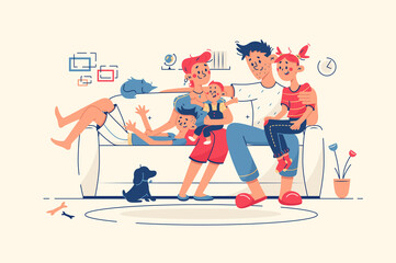 Family together at home on sofa