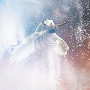 African american woman with white angel wings