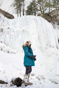 Confident Girl Exploring Tiffany Falls Hamilton Frozen Waterfall