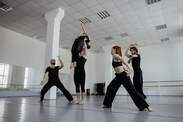 Professional dancers rehearsing tricks