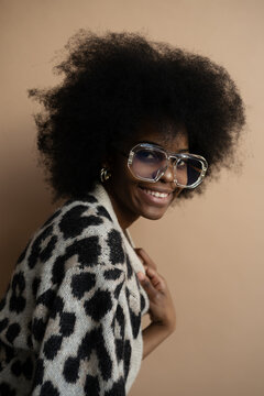 Stylish black woman in eyeglasses