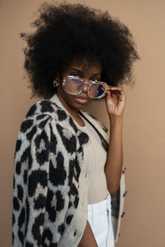 Stylish black woman in eyeglasses