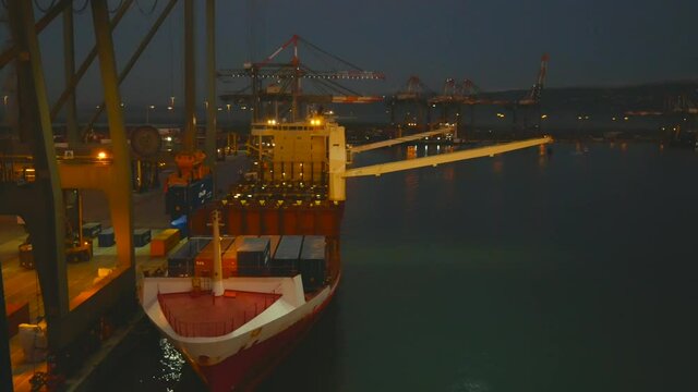 Kingstone, Jamaica - 04.24.2021 Cargo operations on small container ship.