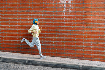 Young Muslim Woman Running