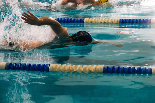 young man training in the pool