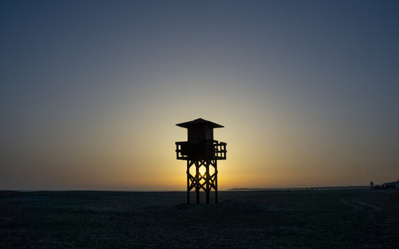 Watchtower silhouette in Sunset