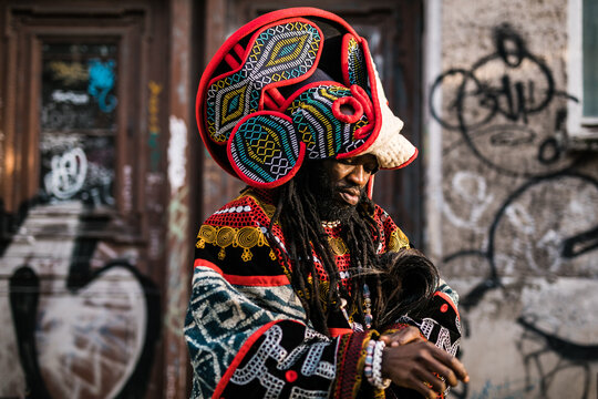 Extravagant African man's portrait in an urban setting