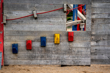 wooden wall with colorful wooden stairs