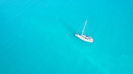A White Yacht On A Turquoise Ocean