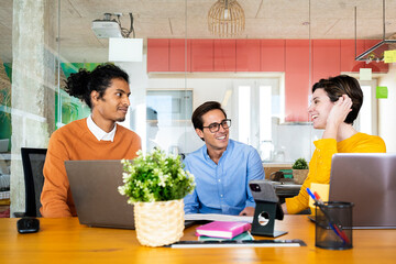 Coworkers Chatting in Office