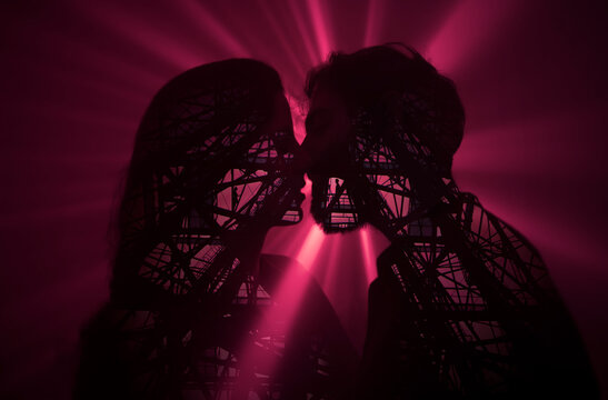 Couple kissing and building together