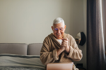 Old Man Using Digital Tablet