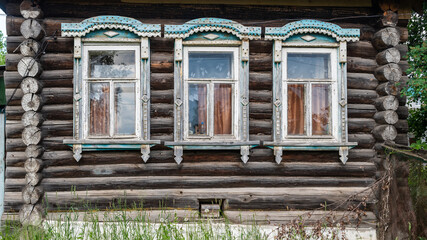 Facade of an old log house, Russia.